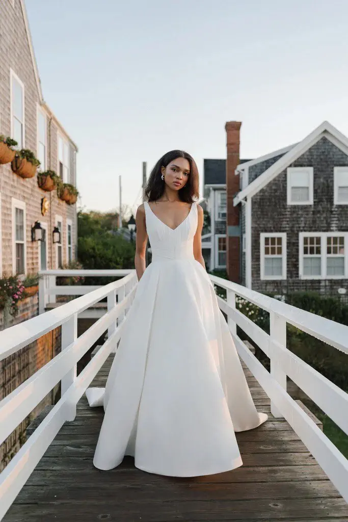 Created for the chic and modern bride, the Blue Willow collection features classic silhouettes combined with playful modern details.