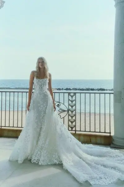 Cutting-edge designs combined with time-honored silhouettes give these Rita Vinieris gowns a truly unique look.