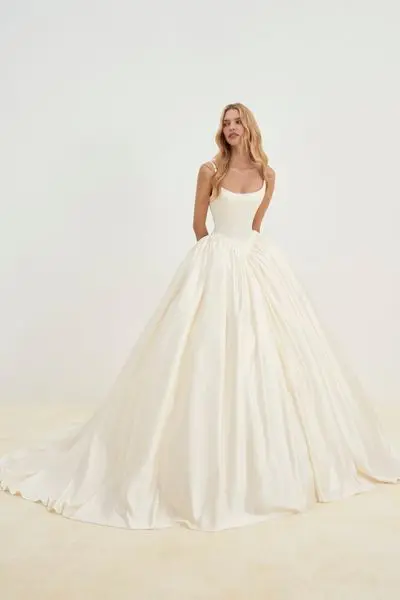 Cutting-edge designs combined with time-honored silhouettes give these Rita Vinieris gowns a truly unique look.