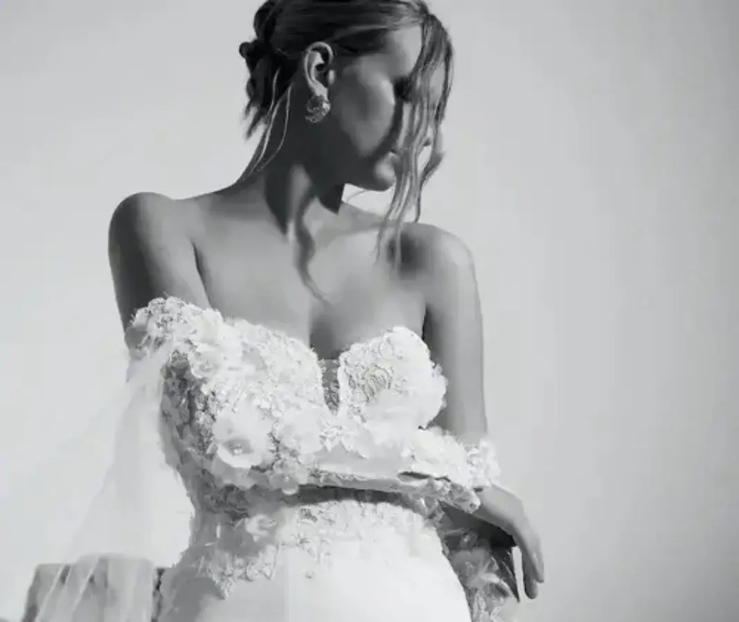 Couture designer gowns typically priced between $3,000 and $6,000 plus a carefully selected line of special-order dresses.