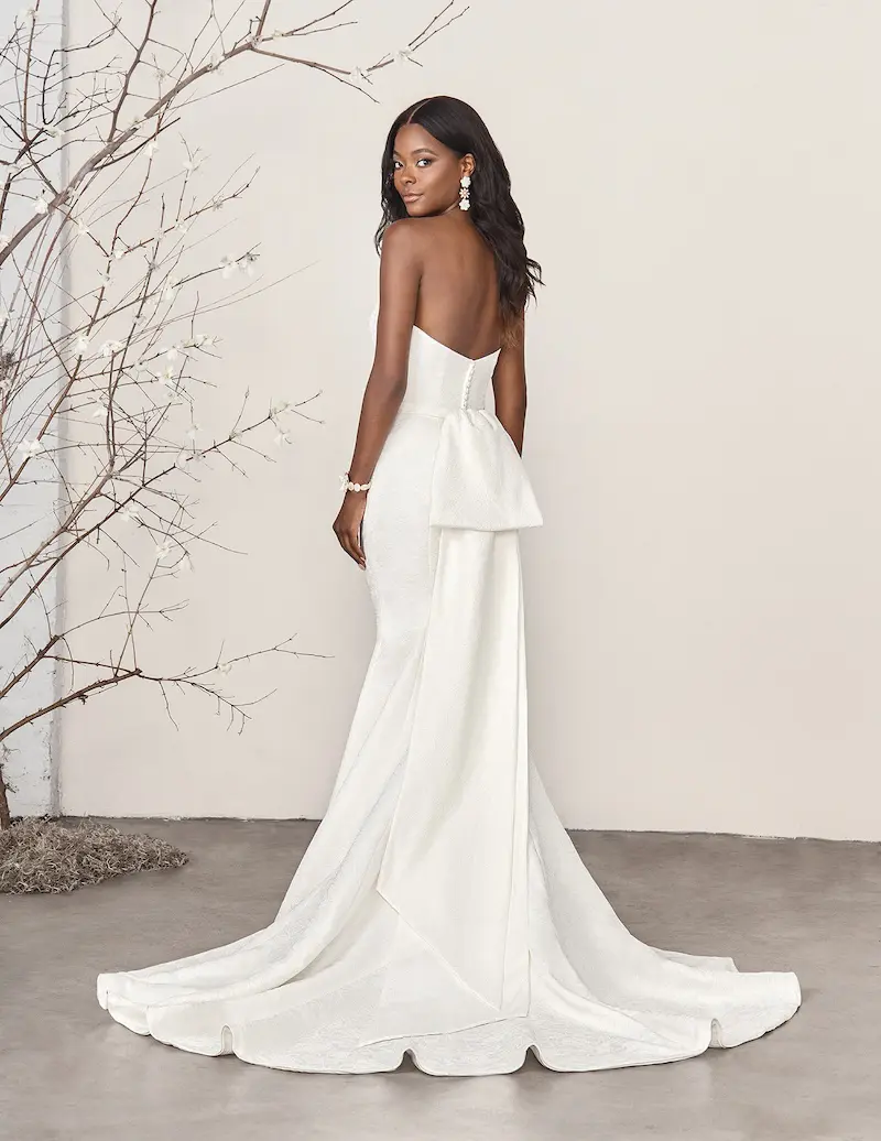 14_112429_1.images Melrose - This strapless fit-and-flare bridal gown showcases the beauty of jacquard fabric, adding texture and subtle dimension to its sleek silhouette.