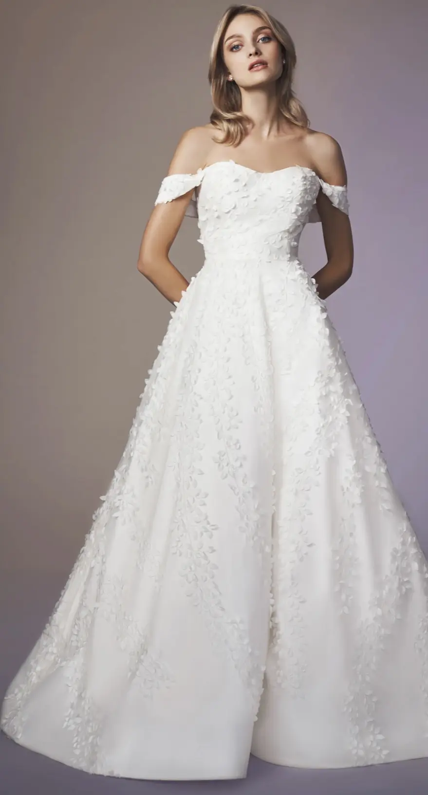 Confetti - The modified sweetheart neckline gracefully frames the décolletage while providing a flattering shape that enhances the overall silhouette.