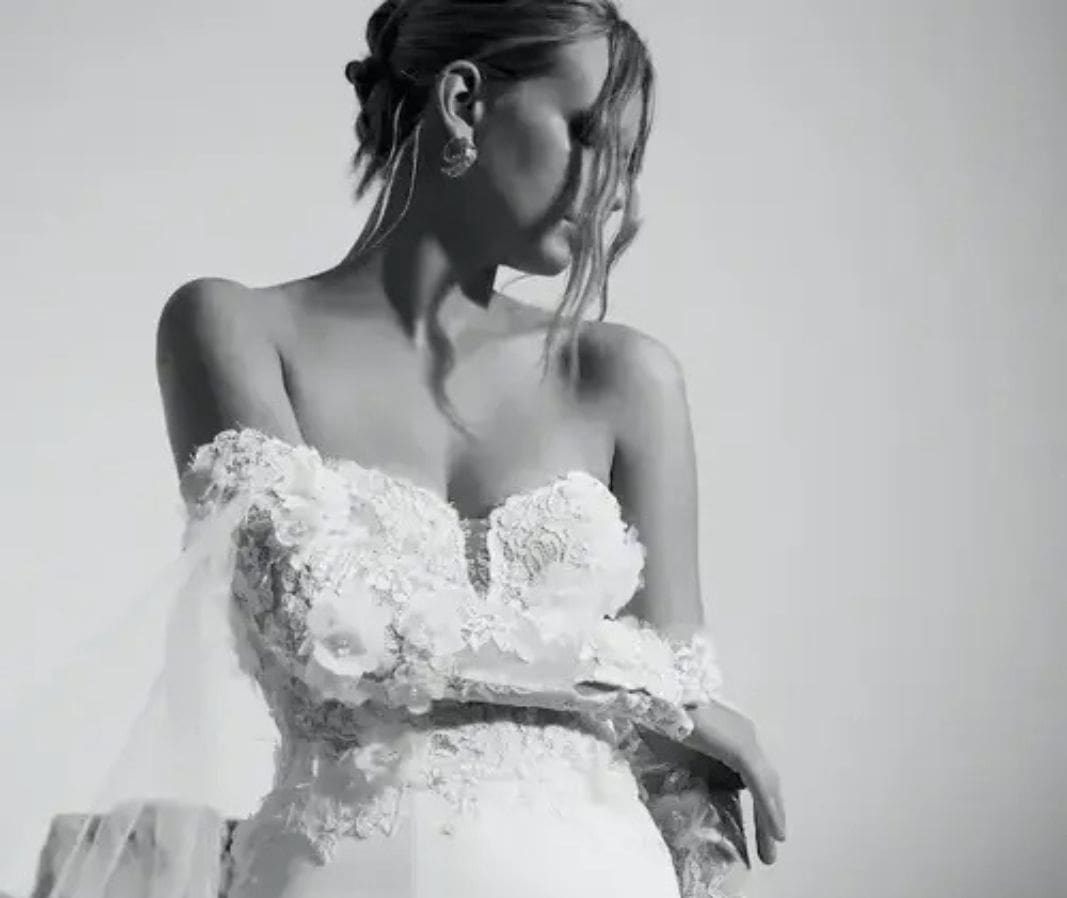 Couture designer gowns typically priced between $3,000 and $6,000 plus a carefully selected line of special-order dresses.